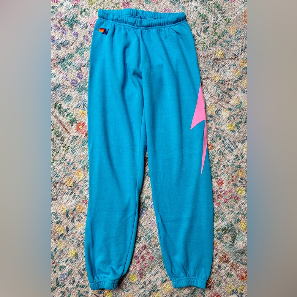 Aviator Nation Teal Sweatpants with Pink Lightning Accent